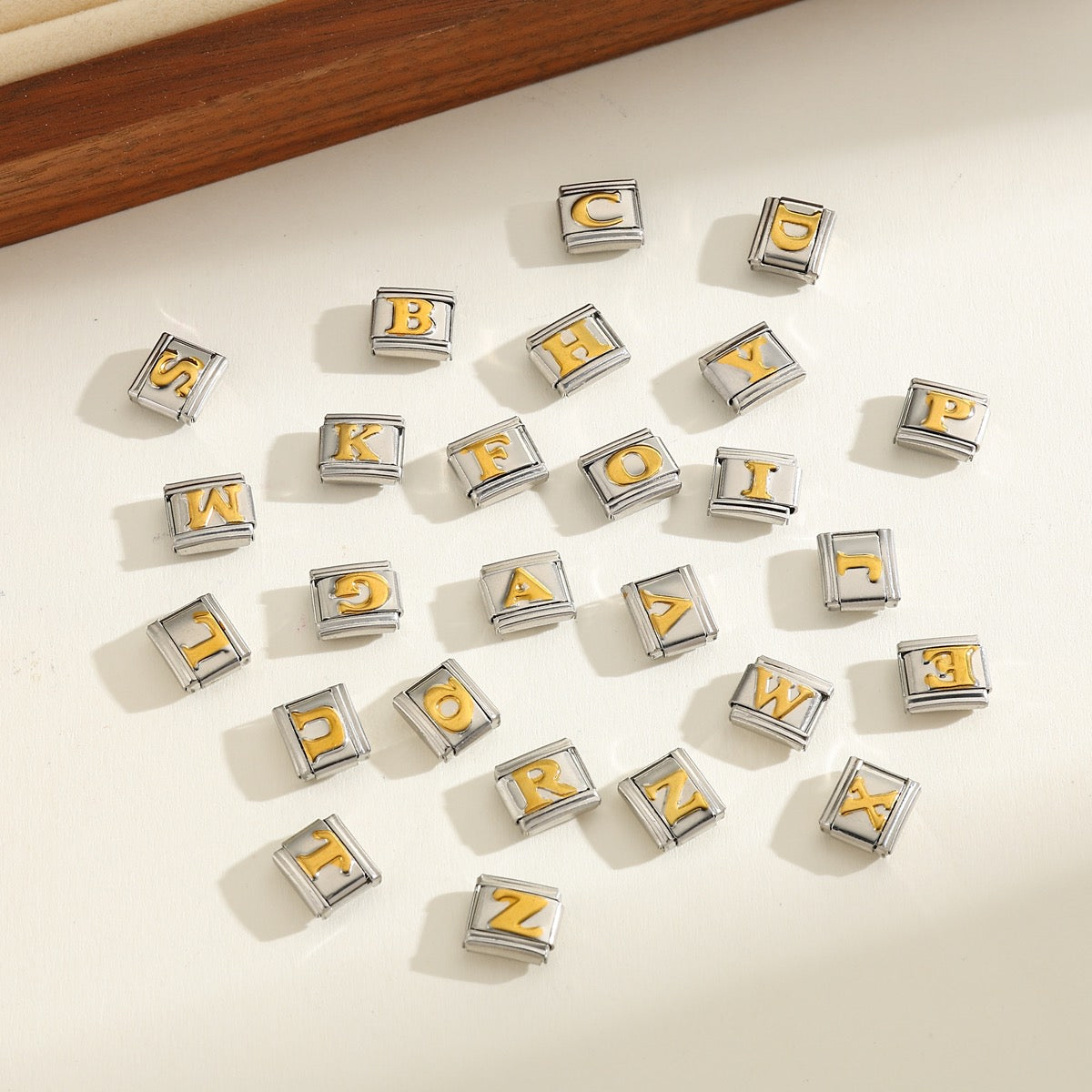 INITIAL CHARM