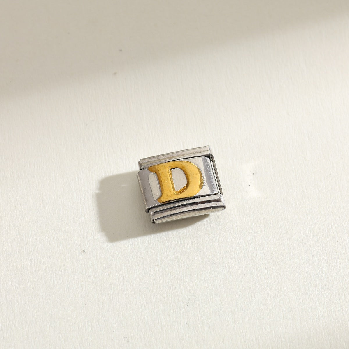 INITIAL CHARM