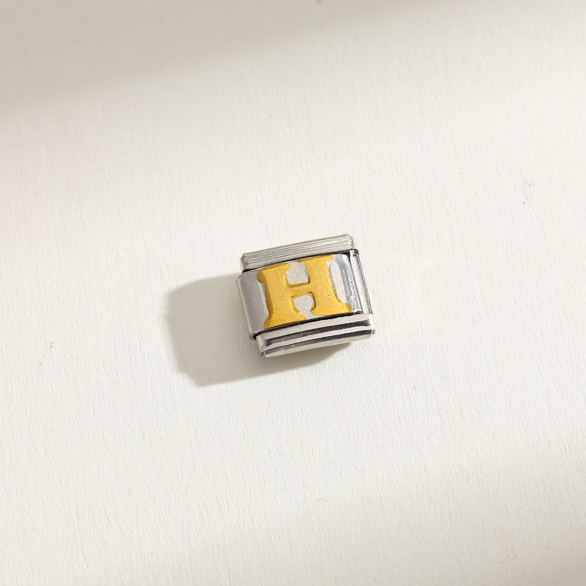 INITIAL CHARM