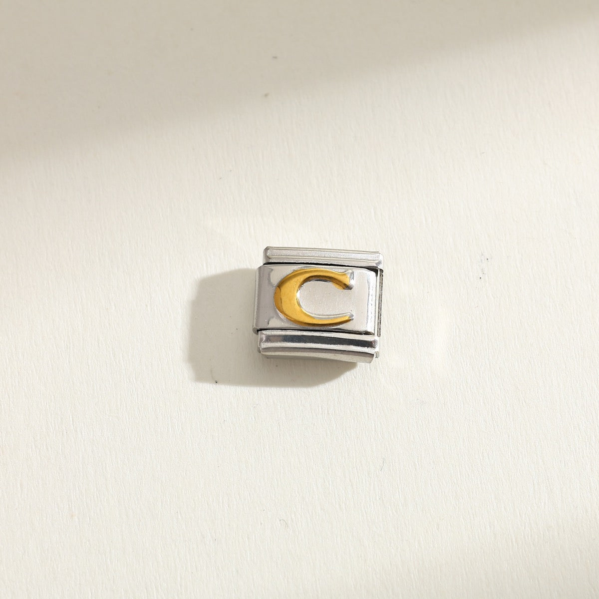 INITIAL CHARM