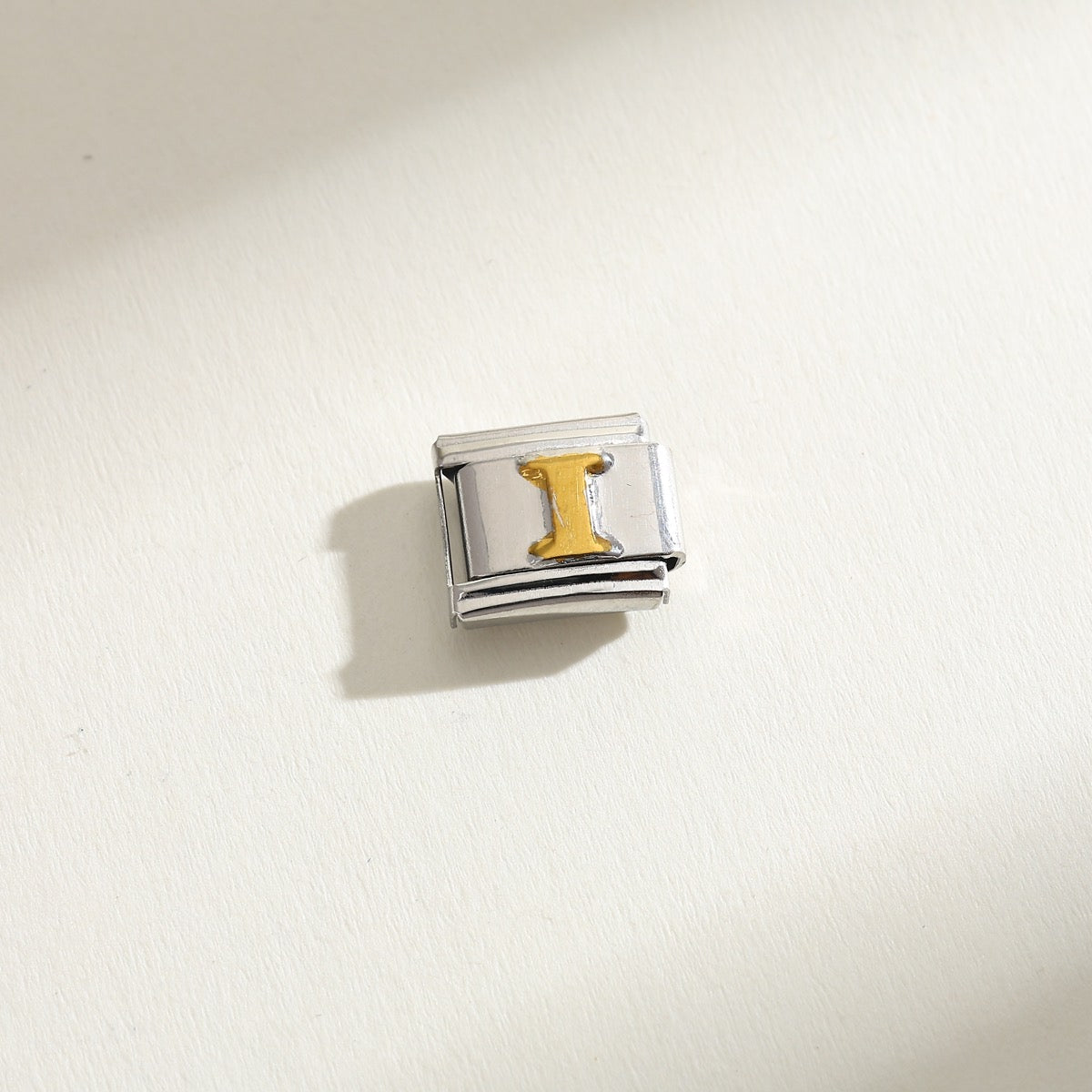 INITIAL CHARM