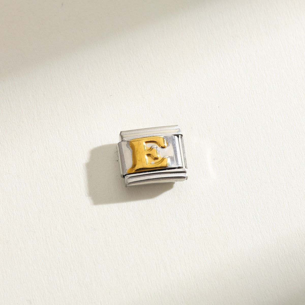 INITIAL CHARM