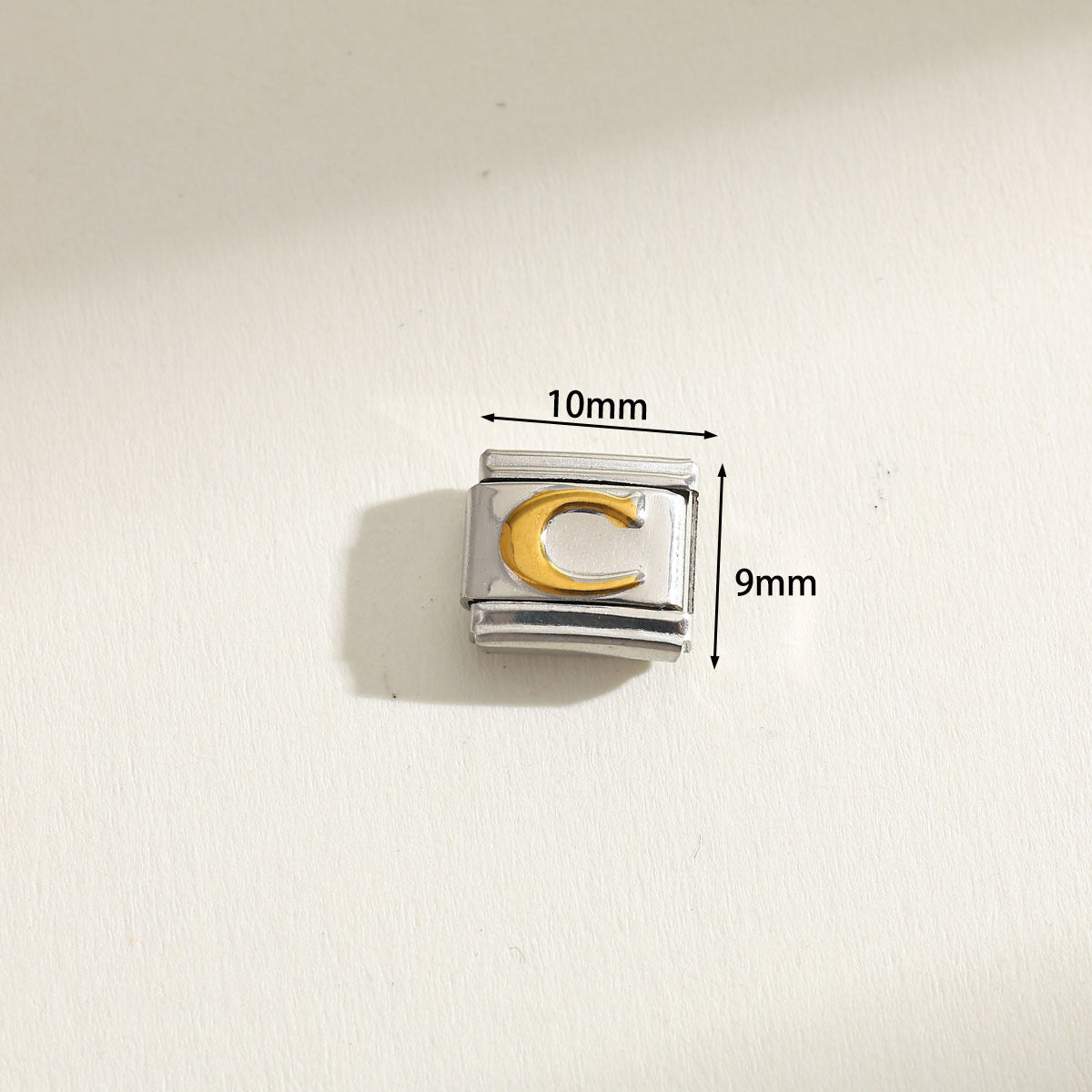 INITIAL CHARM